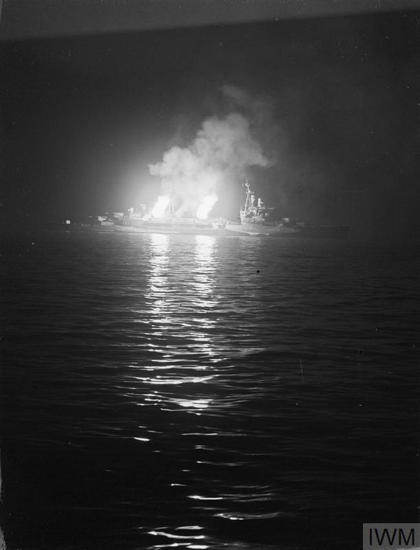 Starboard 4 inch guns of HMS BELFAST open fire on German positions around Ver-sur-Mer June 1944.